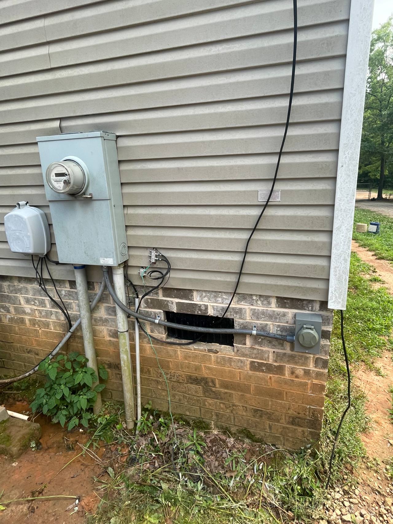 Exterior electrical service and meter base